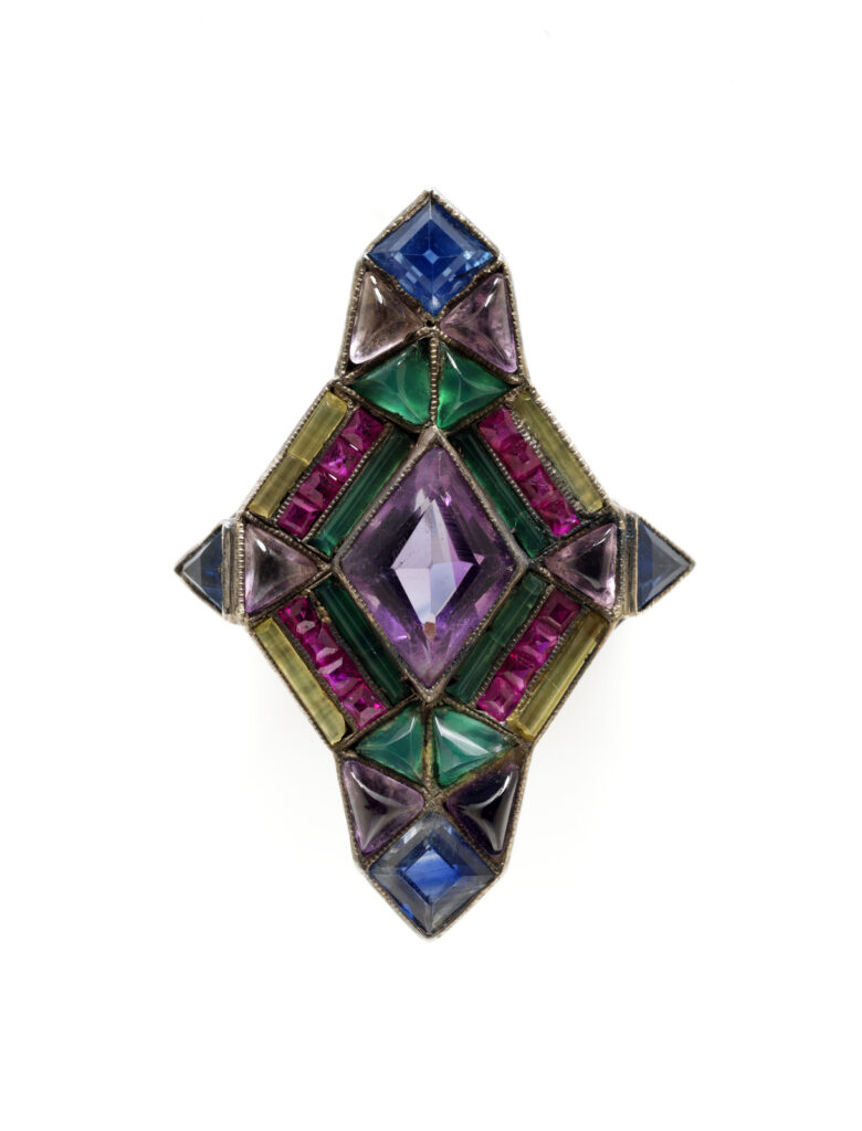 Geometric Art Deco ring with amethyst, sapphires, emeralds, and tourmalines in silver setting.