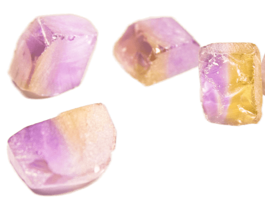 Bi-color ametrine crystals showing a mix of yellow and purple zoning.